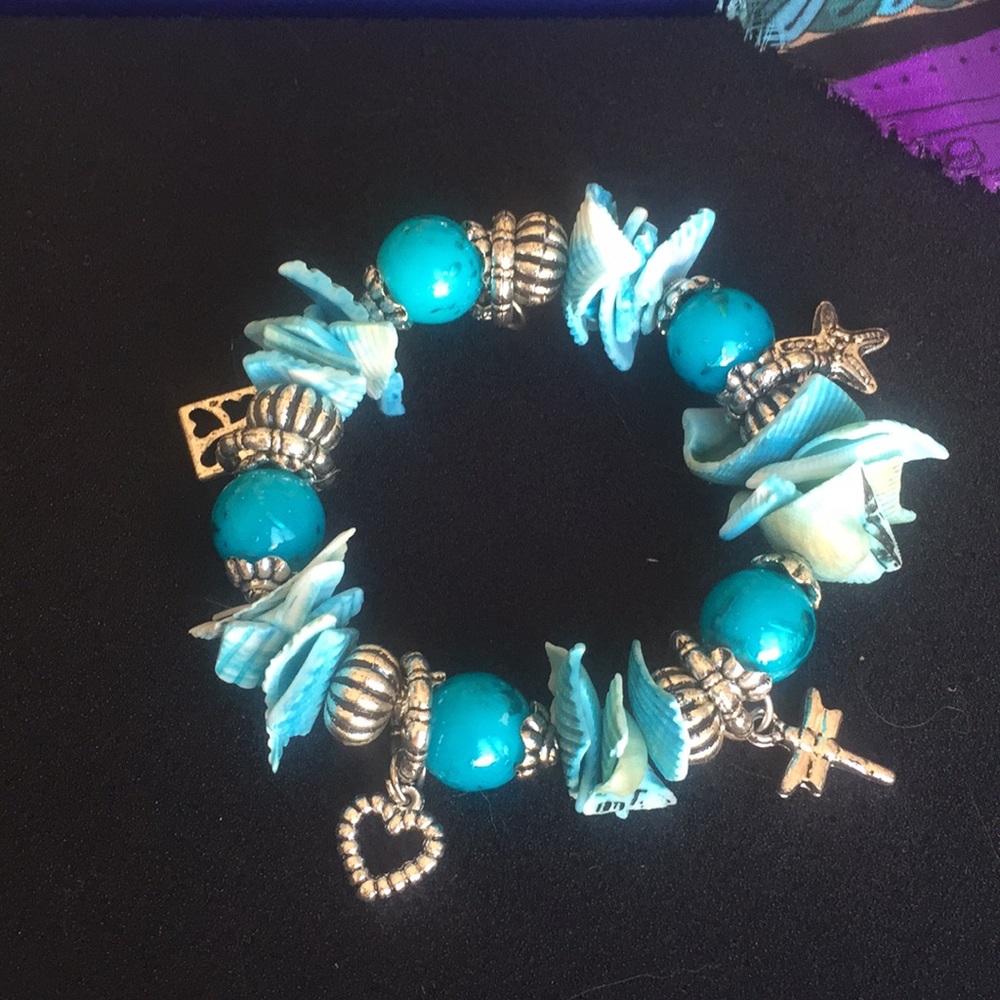 Turquoise blue Shell, Beads & Charms Bracelet